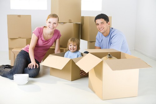 Satisfied customer and moving van in Hammersmith during a service