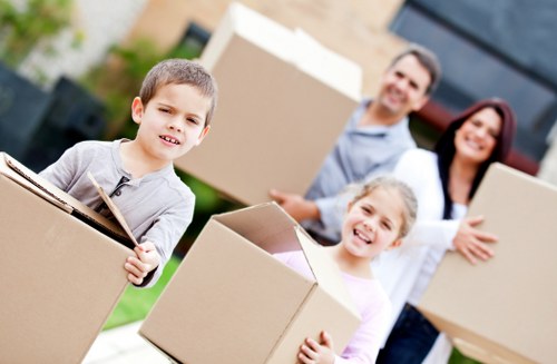 Satisfied customer receiving post-move support in Hammersmith